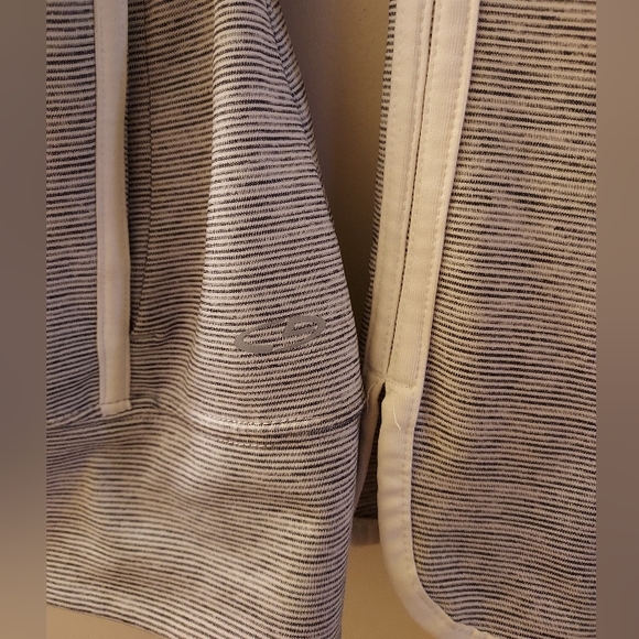 Women's x-small zip up lightweight athletic wear jacket. White with blue strips - Picture 3 of 6